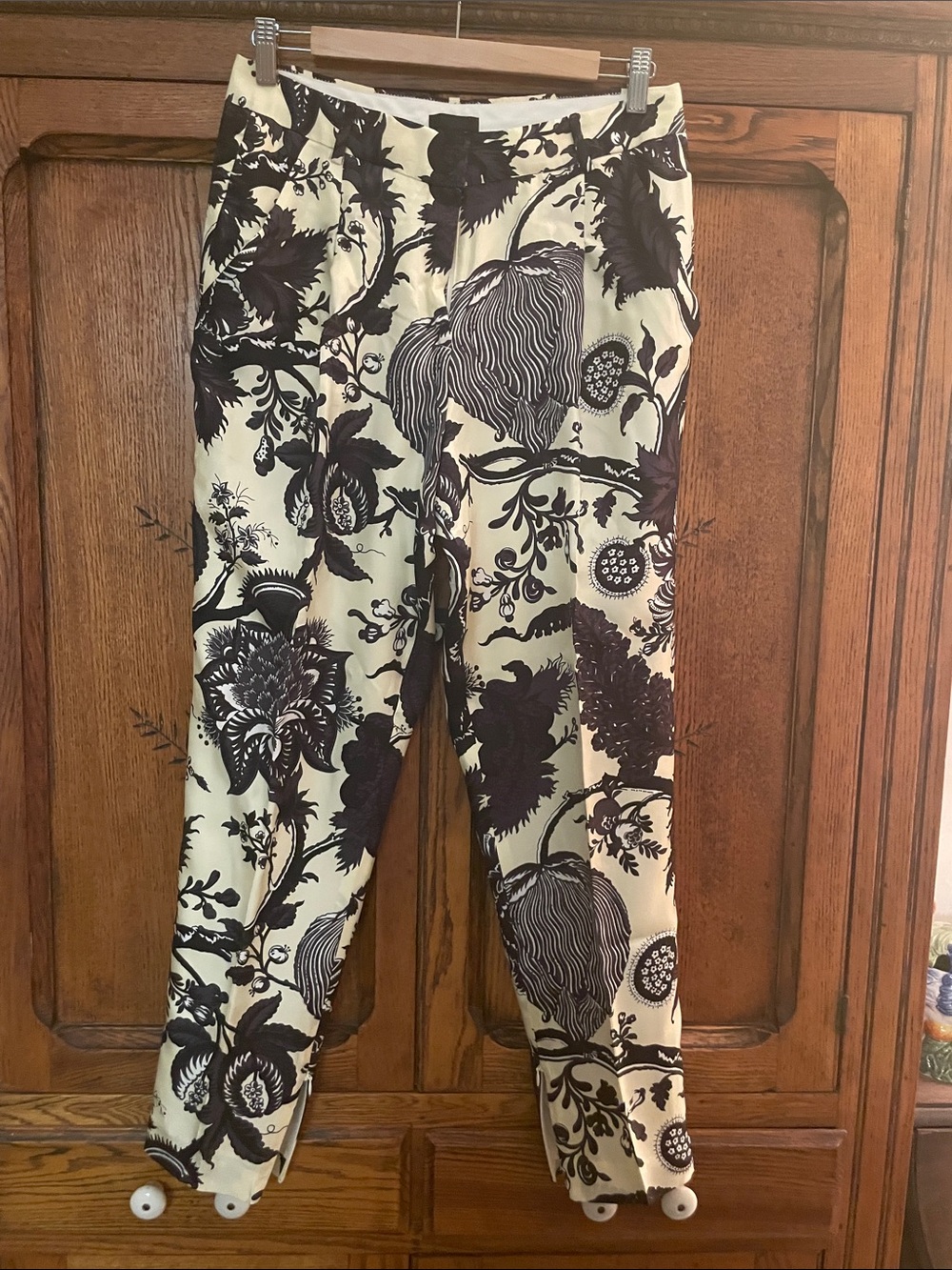 J. Crew Collection Black Floral Print Ankle Pants on Cream Background
